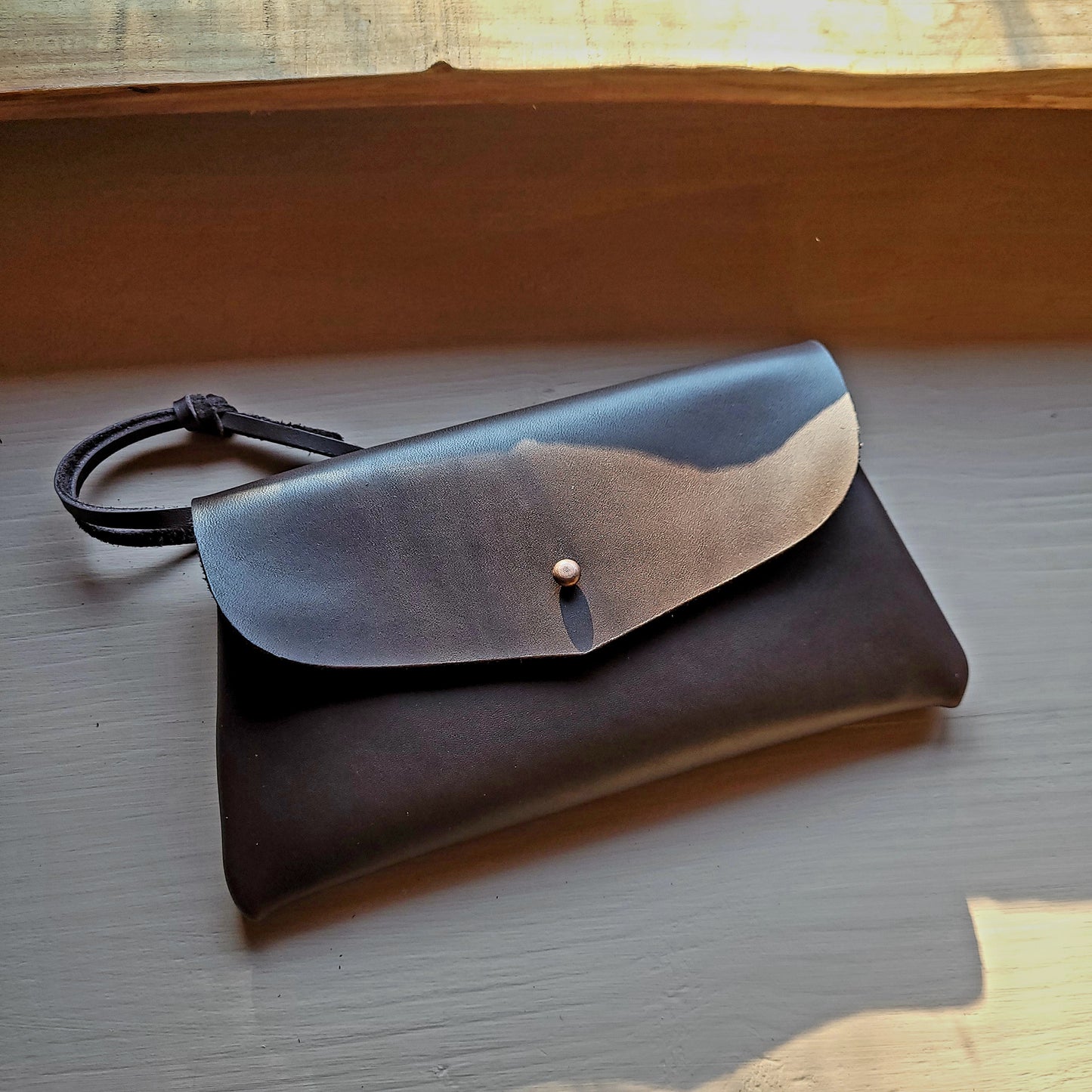DIMPLE Clutch. View Stock.