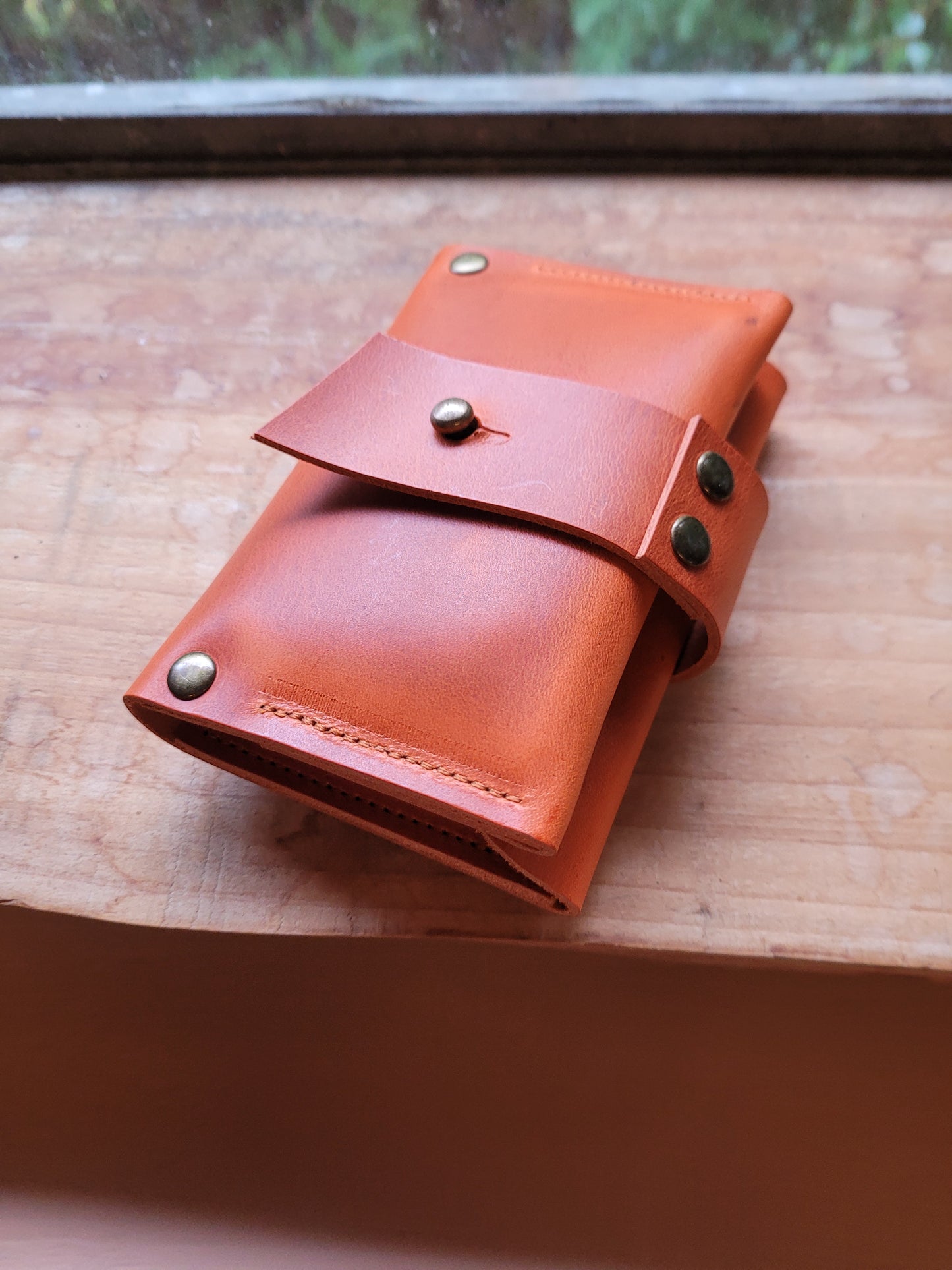 WELA Wallet. View Stock.