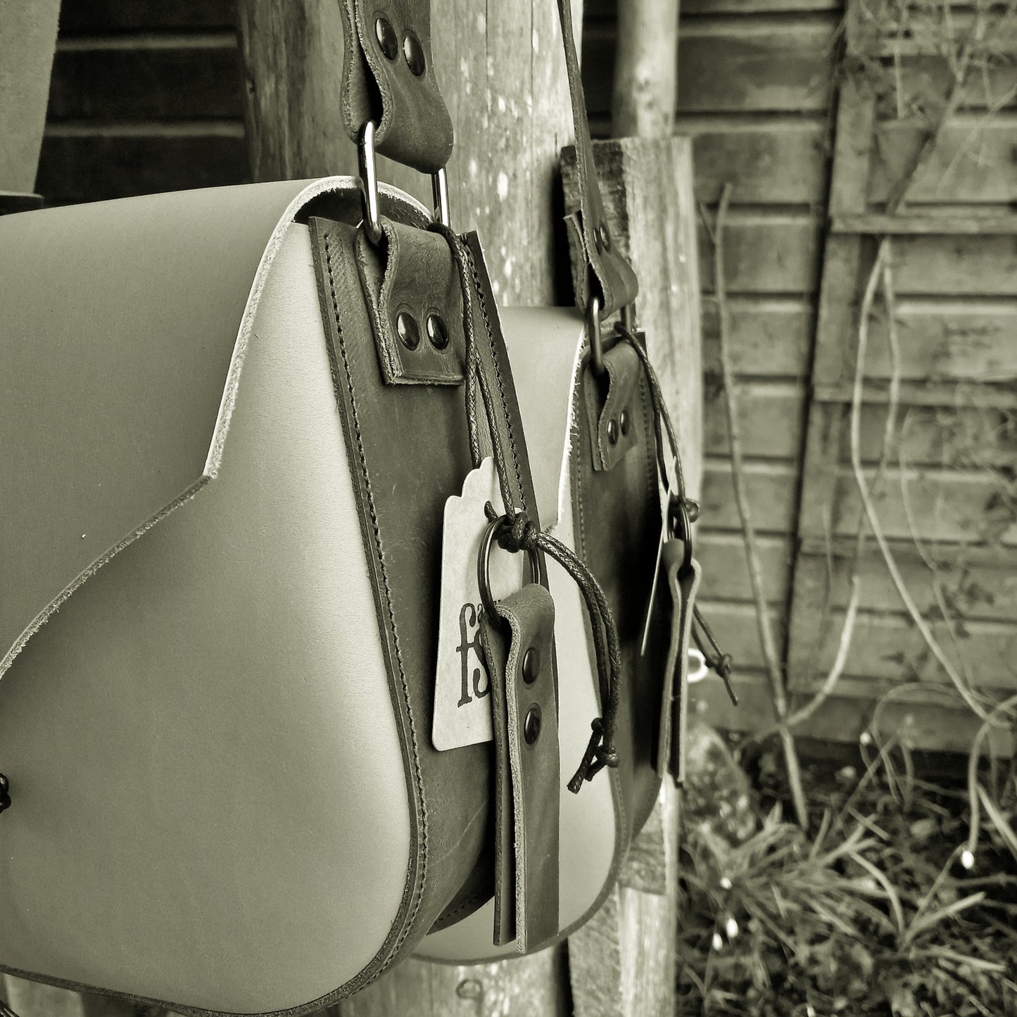 HOMILY Bags. View Stock.