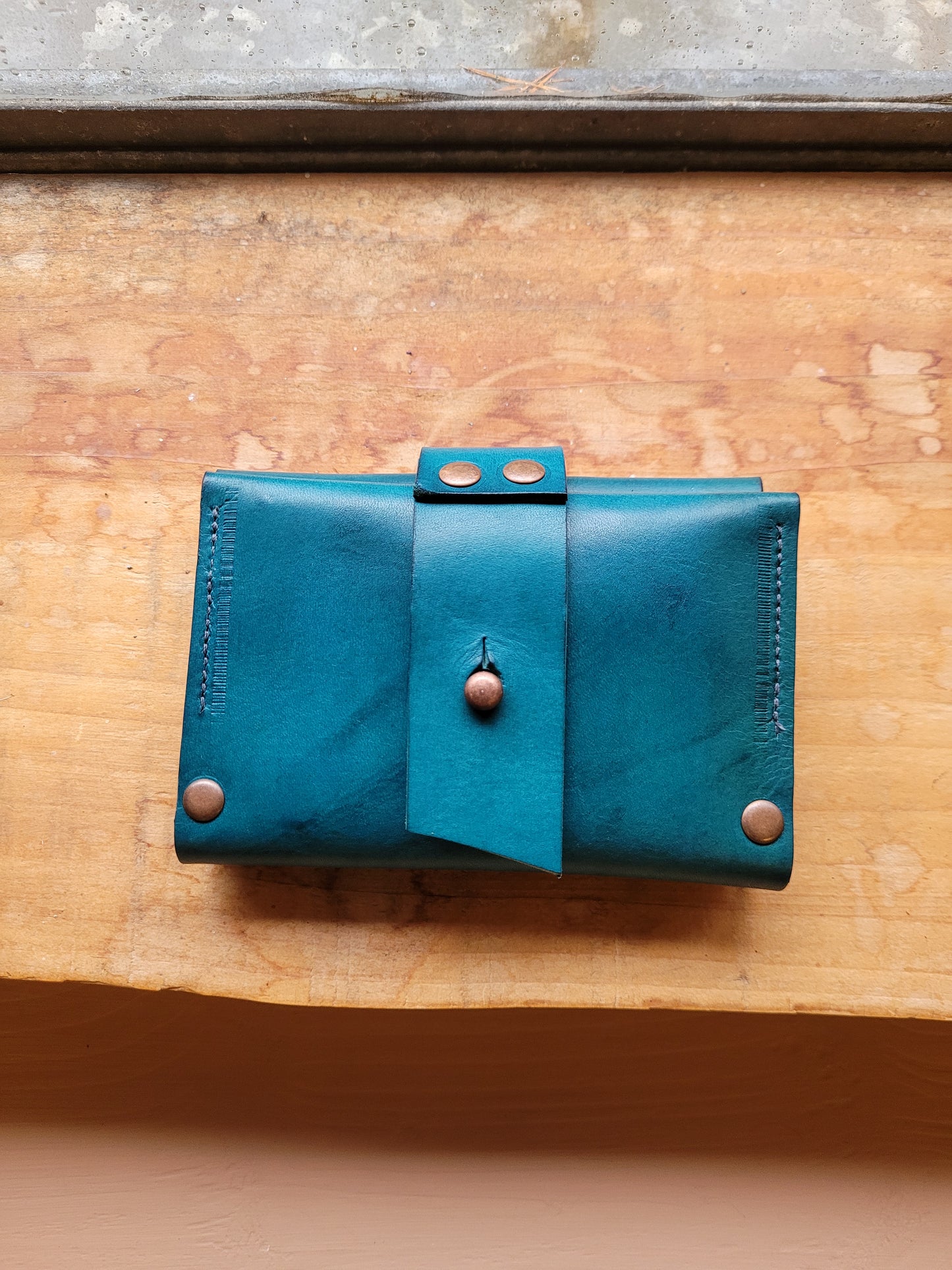 WELA Wallet. View Stock.