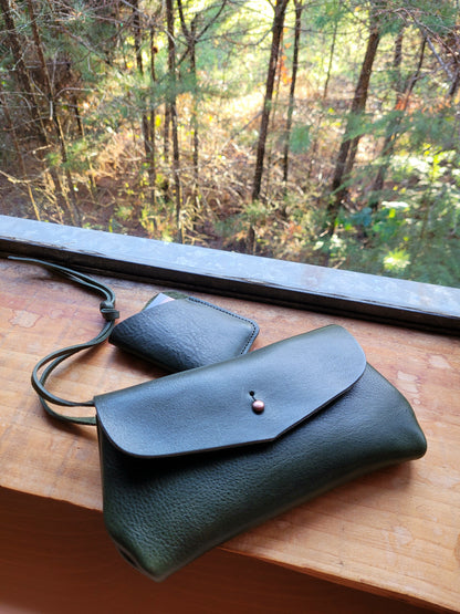 DIMPLE Clutch. View Stock.