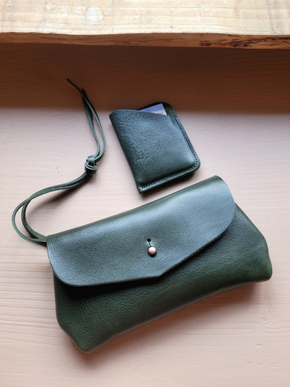 DIMPLE Clutch. View Stock.