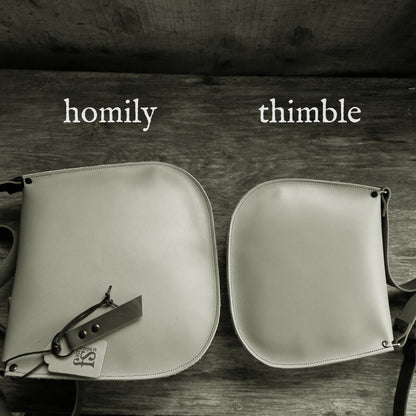 HOMILY Bags. View Stock.