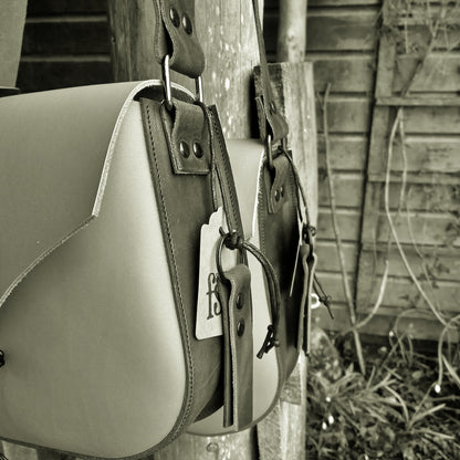 HOMILY Bags. View Stock.